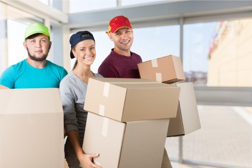 Professional movers loading furniture for a Brunswickpark home relocation