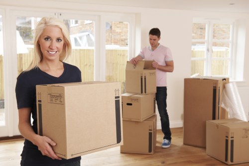 Packed moving boxes and furniture prepared for transport by Brunswickpark movers