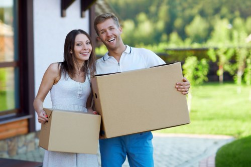 Removalists carefully unloading household items at a Brunswickpark property