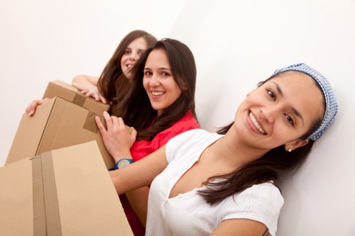 Professional movers loading furniture for a Brunswickpark move