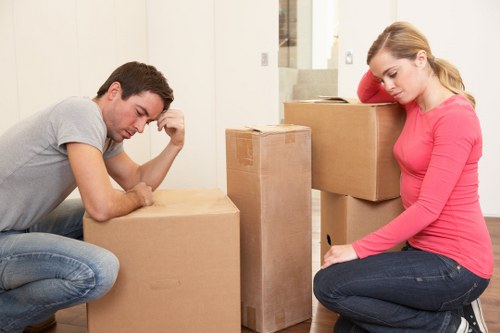 Unpacking service arranging boxes and essentials in a new Brunswickpark home