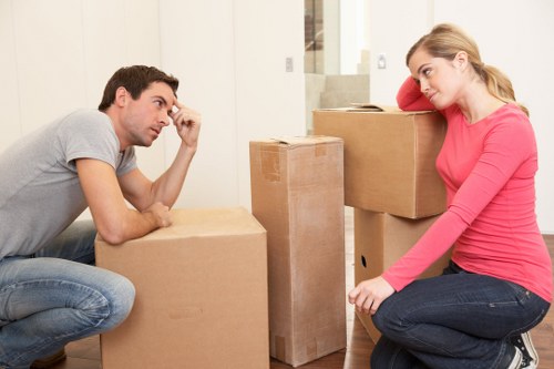 Office furniture and packed supplies ready for a Brunswickpark commercial move