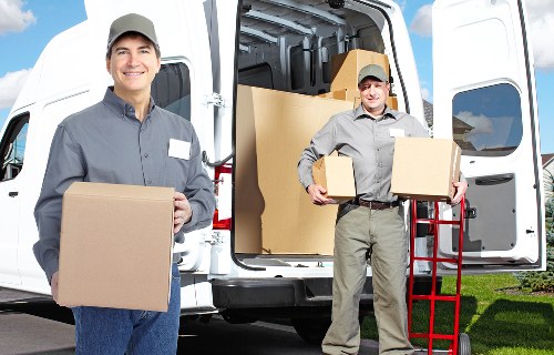 Careful loading of business equipment during a local office relocation