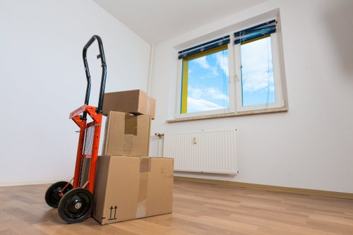 Packed office boxes and furniture prepared for transport