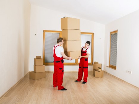 Apartment moving setup with boxes and furniture in Brunswickpark